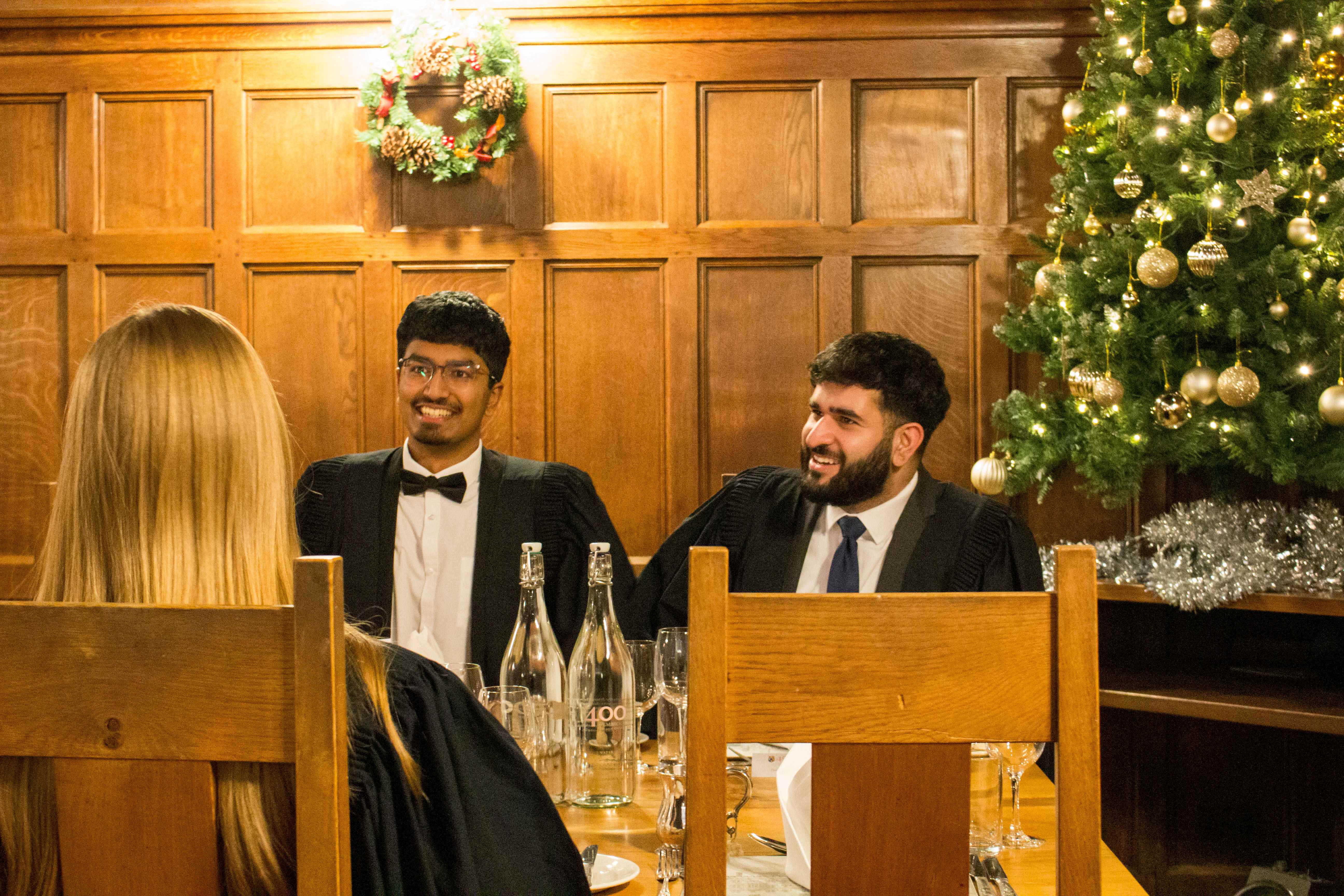Two students at formal dinner.