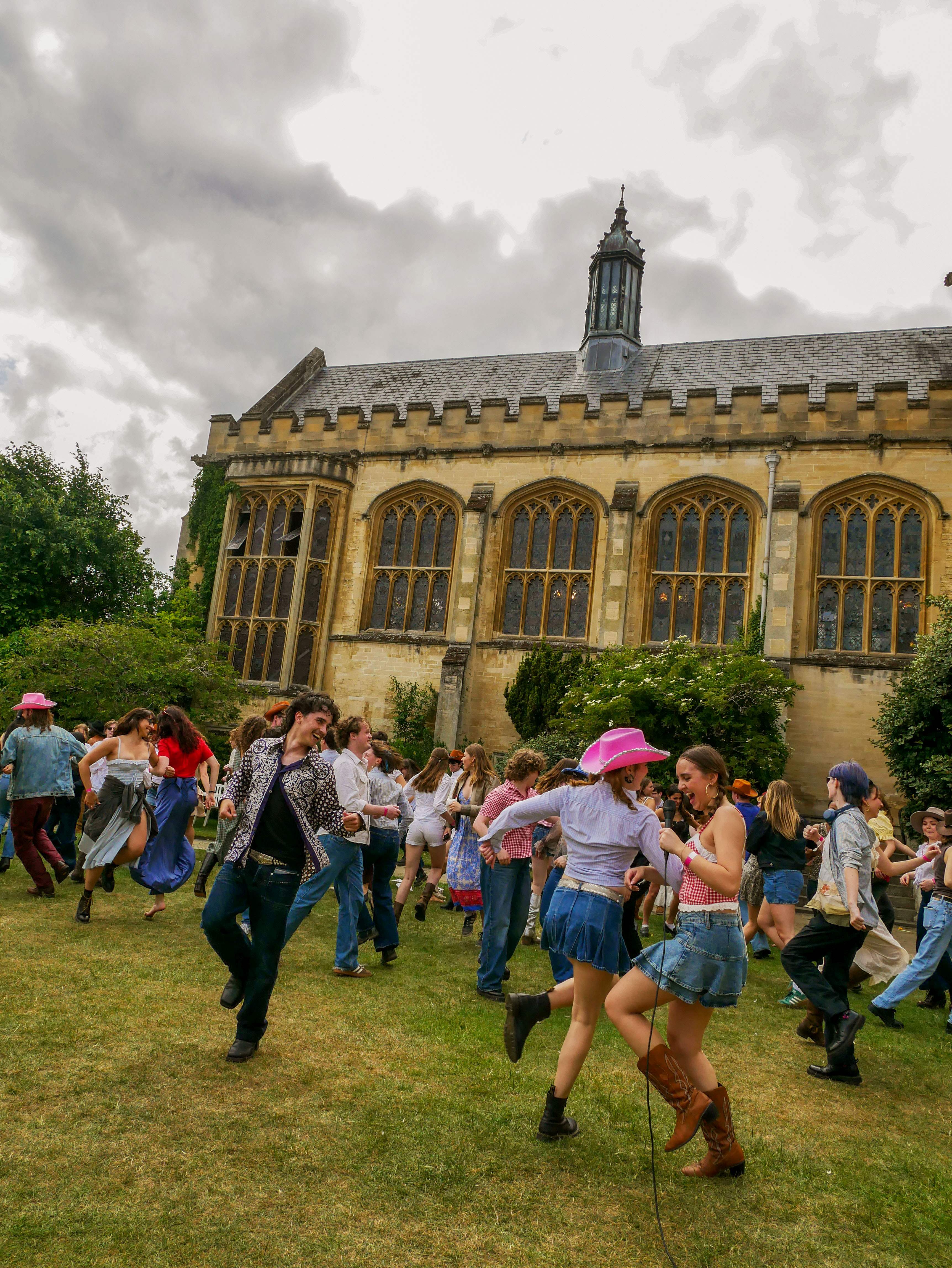 Pembroke students line dancing at their annual Garden Party.
