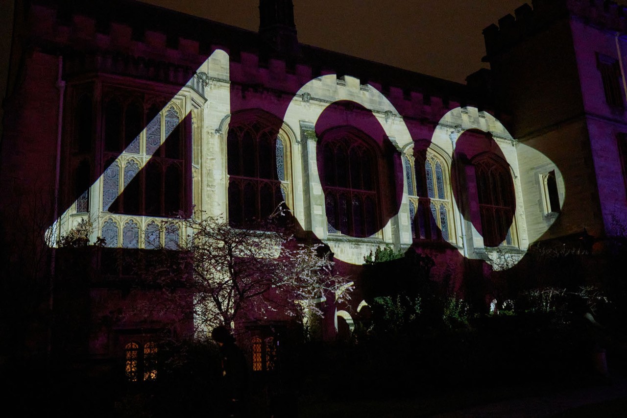 The 400 logo projected onto the front of the Hall.
