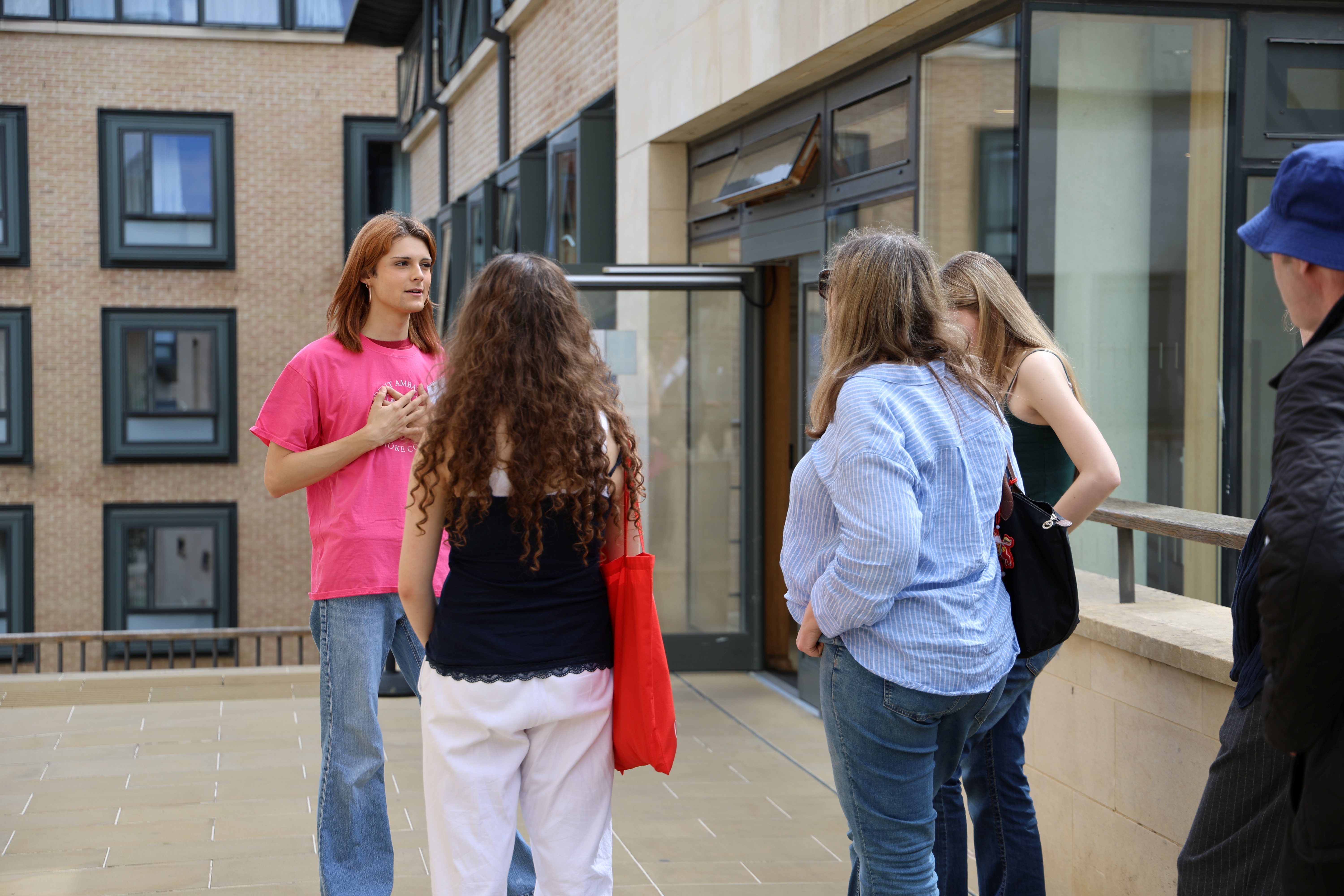 Pembroke student ambassador giving a tour of College.