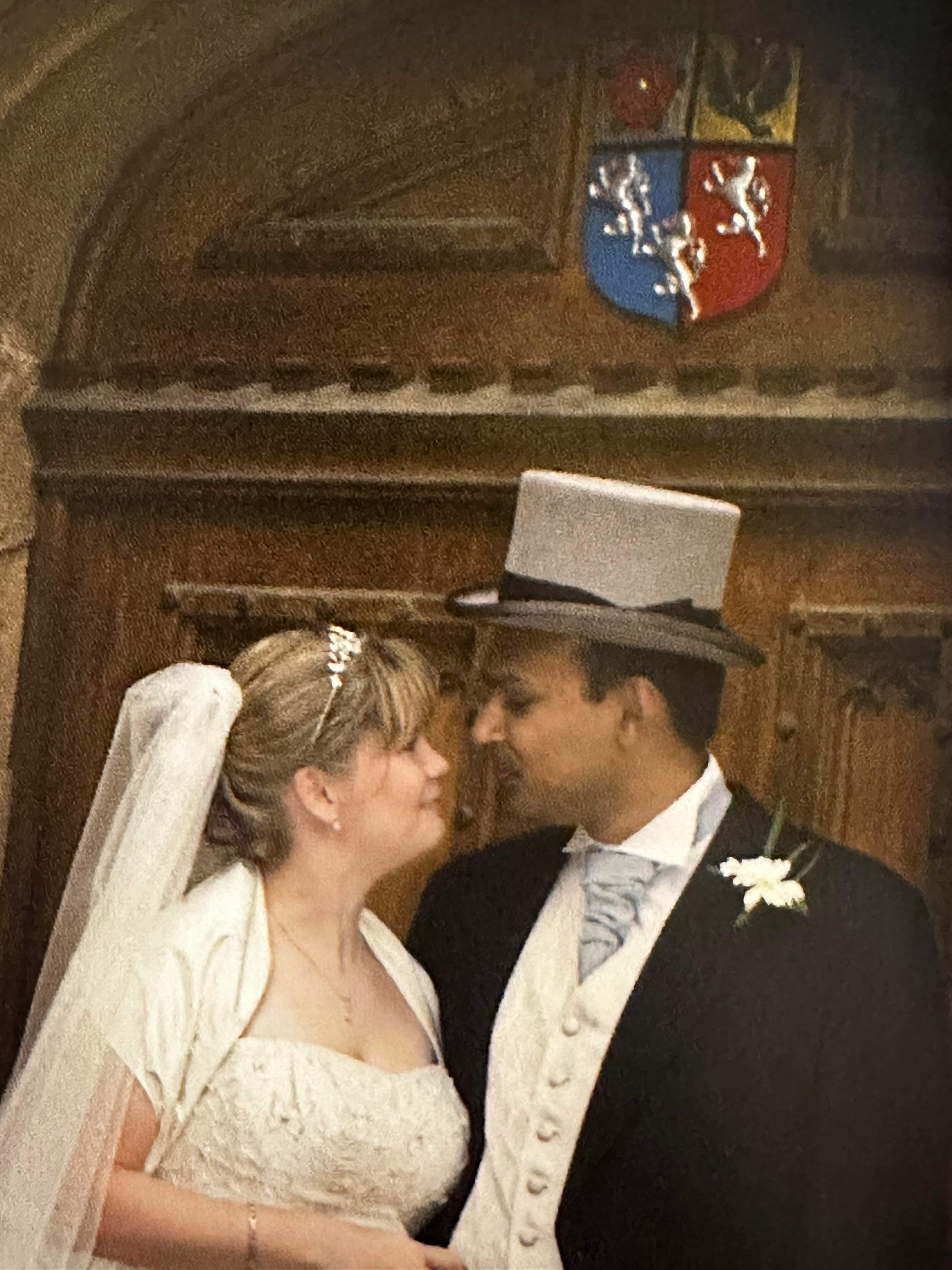 Claire and Aruna on their wedding day in 2008, pictured outside Broadgates Hall.