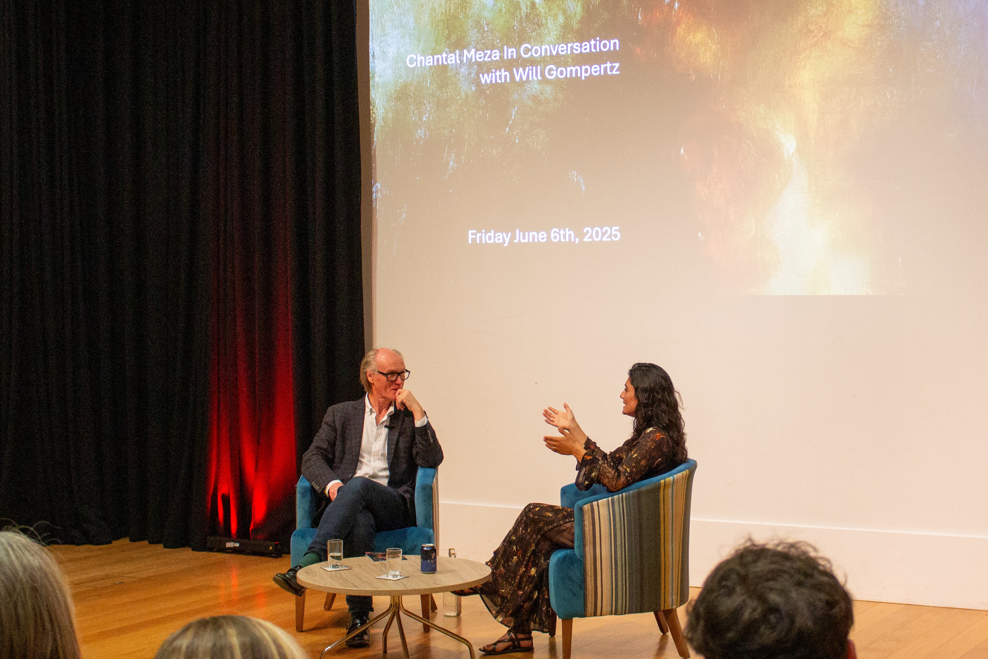 Mexican painter Chantal Meza in conversation with Will Gompertz at the opening of her exhibition.