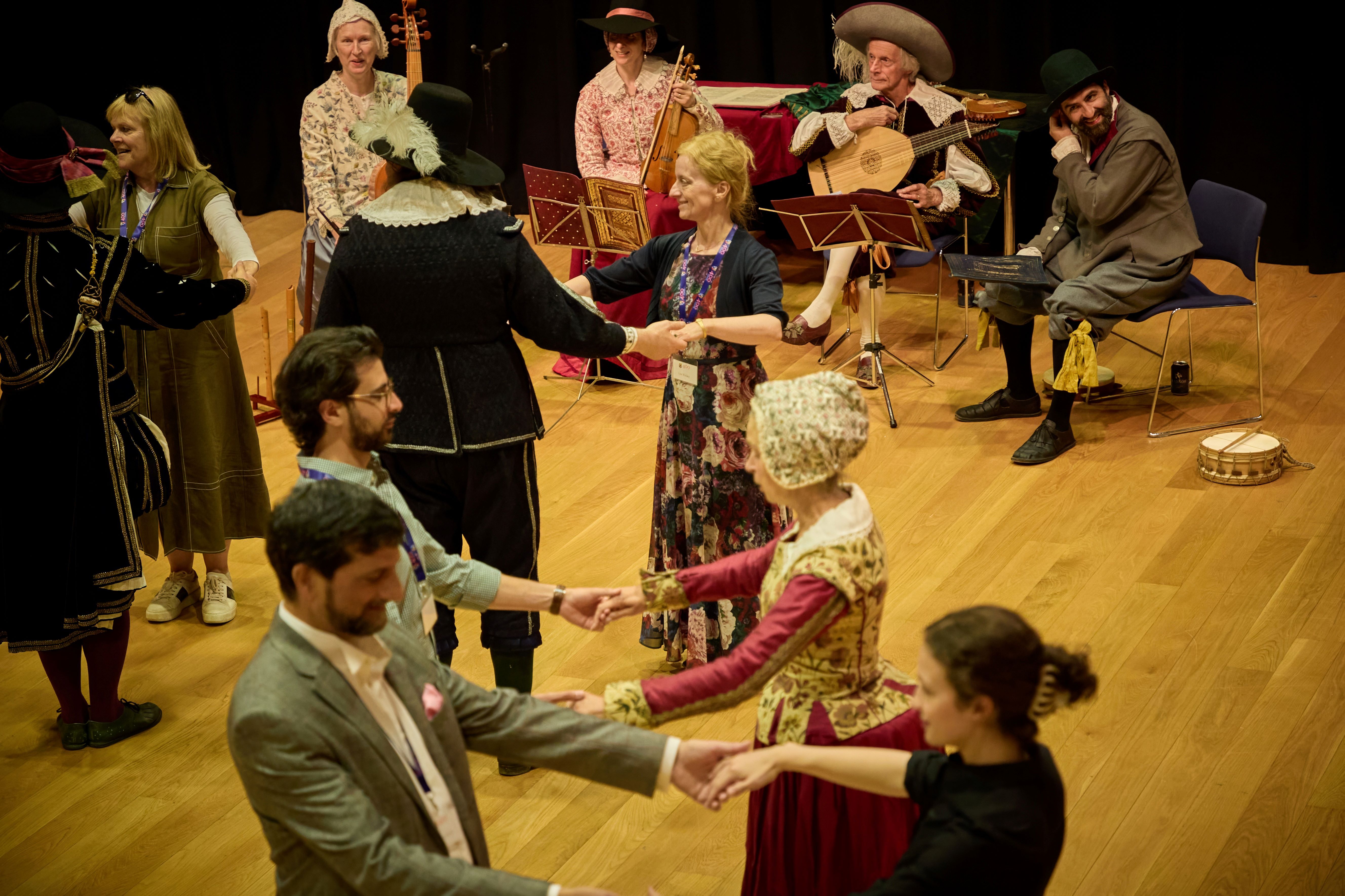 Musical group Passamezzo leads guests in 17th century dance.