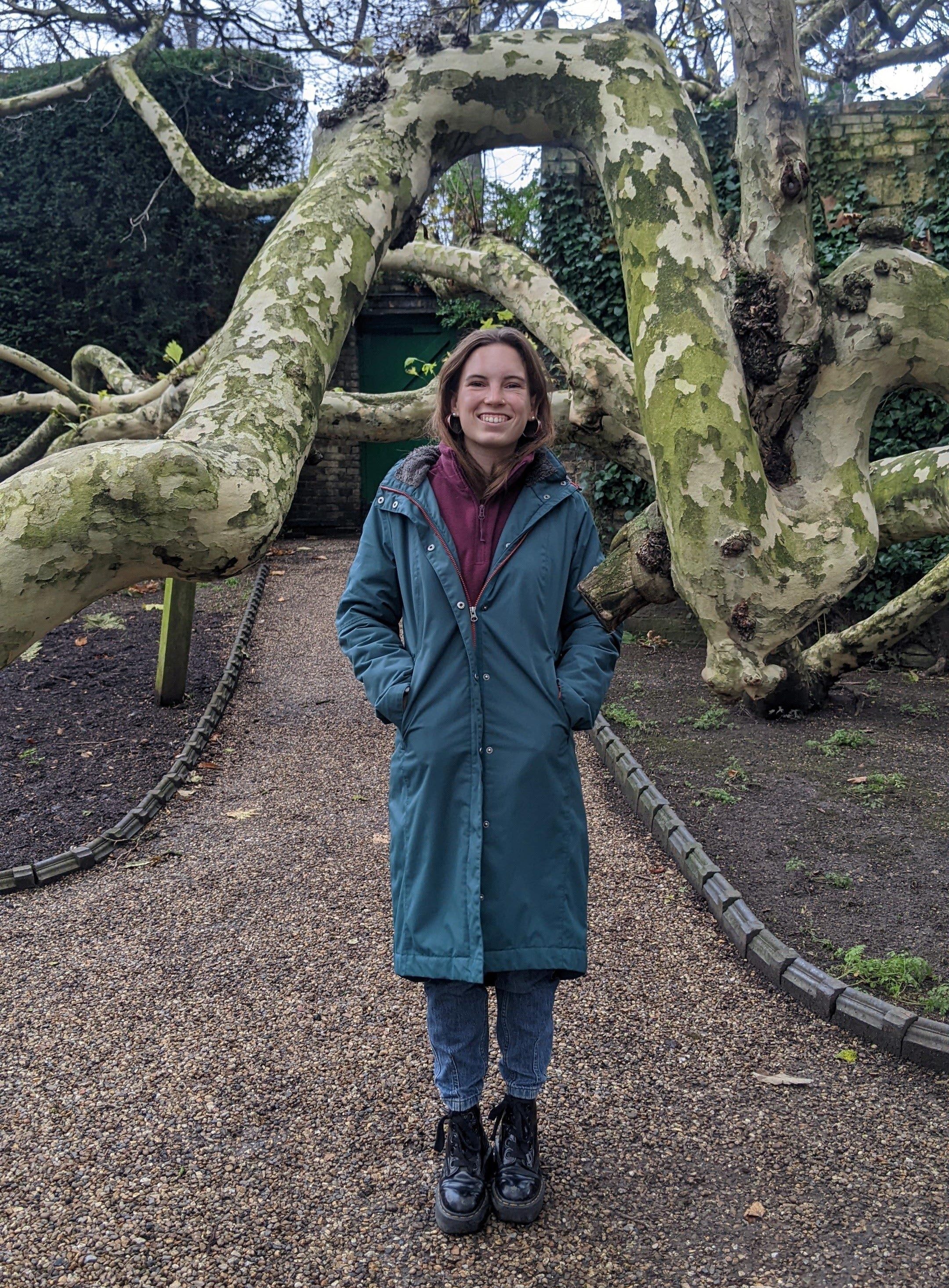 Ruth Arnold standing with tree behind