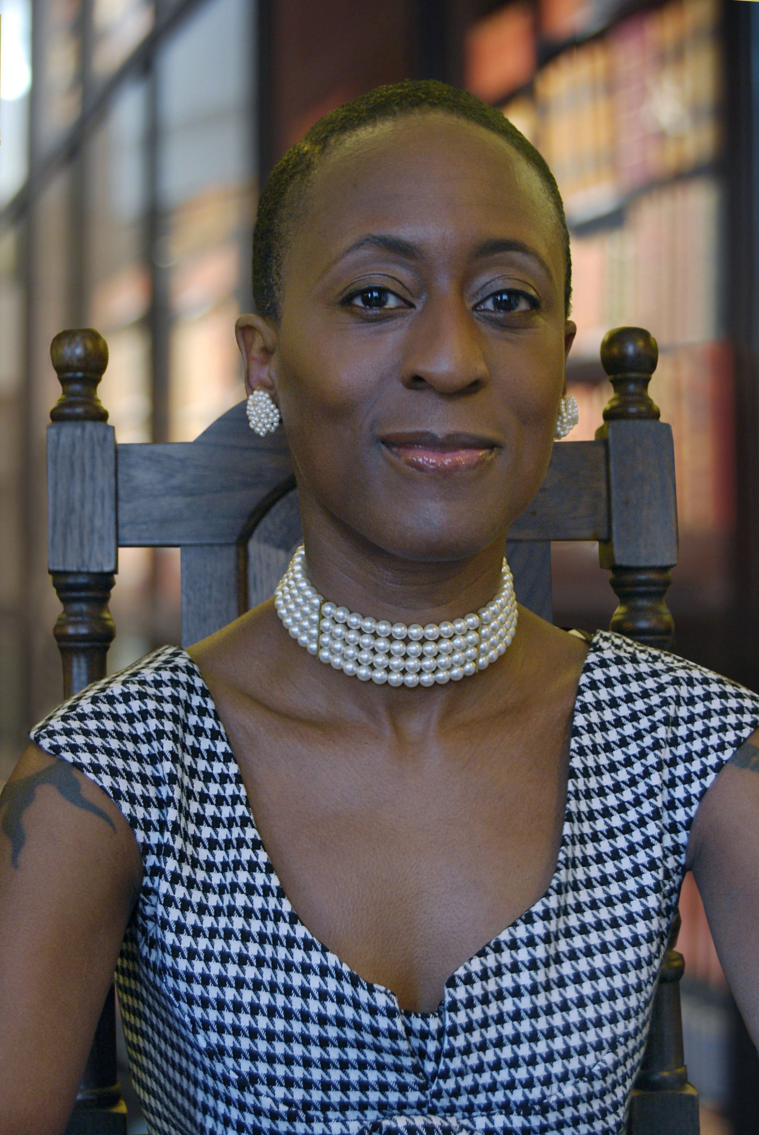 A headshot of Patience Agbabi.