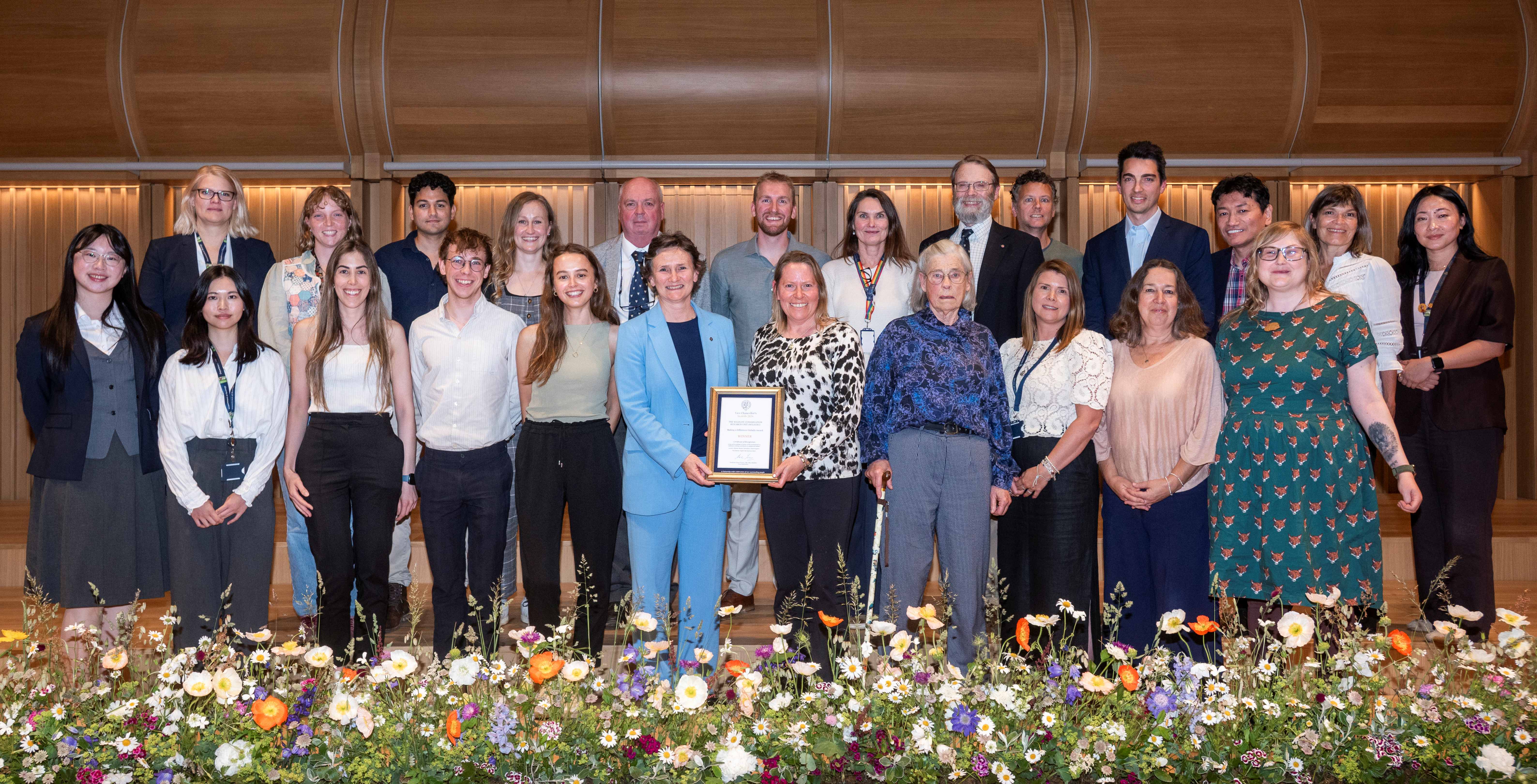 WildCRU receiving their award from the Vice Chancellor