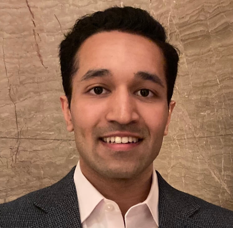 Head shot of Anuraag Vazirani smiling.