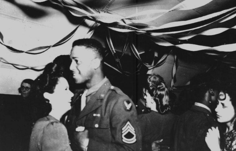 African American WWII soldiers dancing with English women.