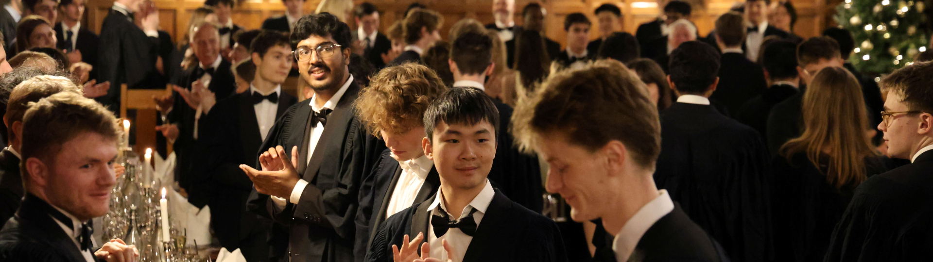 Students stood in Hall applauding