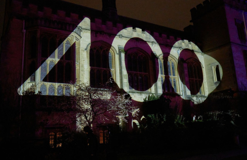 The 400 logo projected onto the front of the Hall as part of the 400th Anniversary Internal Launch event.